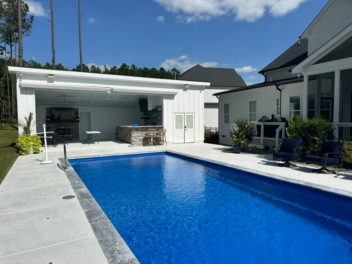 A residential pool serviced by The Pool Collective in Wilmington, NC